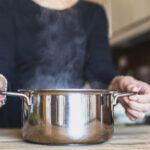 Woman holding a casserole pan