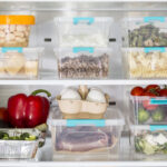 fridge with plastic food containers