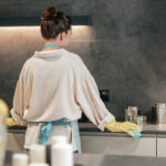 Woman cleaning in the kitchen