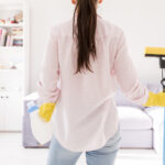 woman cleaning her house